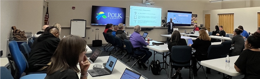 A Polk County team session reviewing infrastructure intelligence workflows on screen